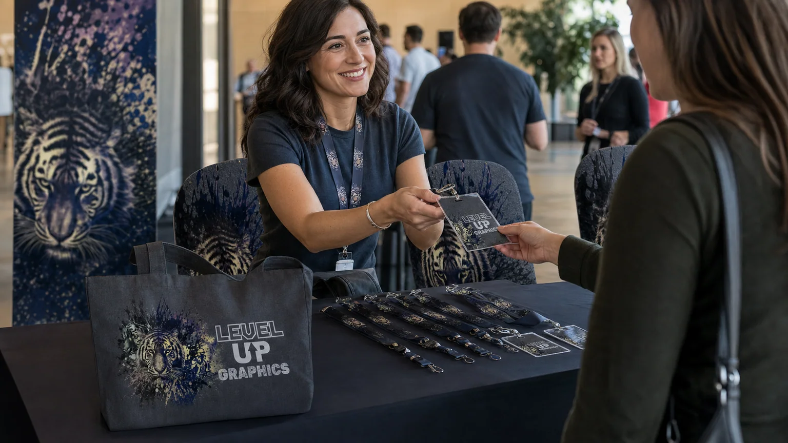 Level Up branded bags, lanyards and promotional accessories in use